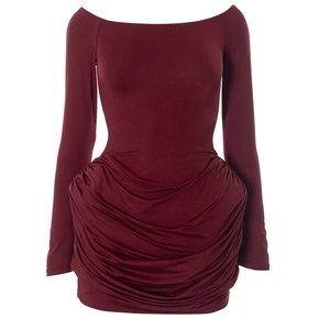 Detail of the elegant ruched texture and off-shoulder design on this burgundy mini dress
