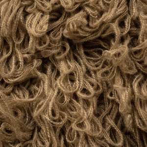 Close-up detail of high-quality dark brown fluffy knit fabric with soft curly texture