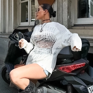 Chic white distressed hollow out sweater in loose fit for a stylish streetwear look