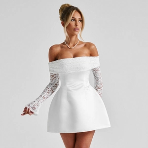 Close-up of white off-the-shoulder lace bodice and flared long sleeves on a mini dress