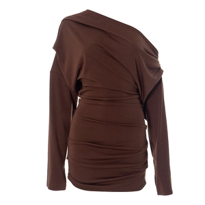 Detail view of the asymmetric one-shoulder neckline and ruched texture on the brown dress