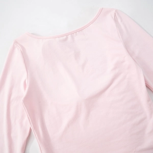 Close-up of pink long-sleeve top showing round neckline and premium stitching details