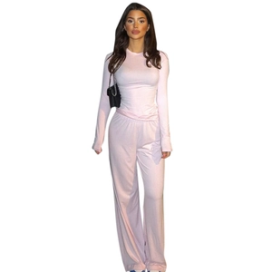 Women's minimalist long sleeve round neck top and wide leg pants set in pale pink