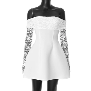 Detailed view of intricate white floral lace patterns on the off-shoulder sleeves