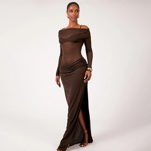 Detail of sheer mesh off-shoulder top and high slit brown maxi skirt with elegant draping