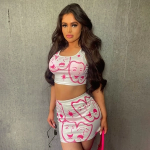 Two-piece street style outfit with pink mask print and rhinestones on white mini skirt set