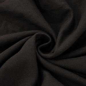 Macro shot of high-quality black knit fabric showing soft texture and fine ribbed details