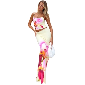 Elegant two-piece floral crop top and bodycon maxi skirt set with purple iris print