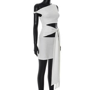 Detail of white bodycon dress featuring one-shoulder design and side cutout with long ribbons