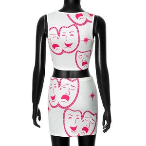 Back view of a white ribbed knit set with pink comedy tragedy masks and star patterns