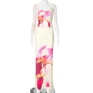 Detail of floral print crop top and high waist slim skirt set with pink iris pattern