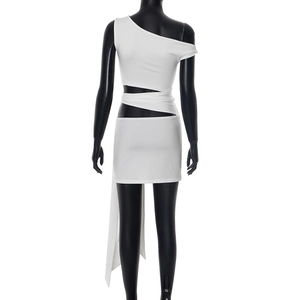Detail of white off-shoulder mini dress with waist cutout and wrap-around strap design