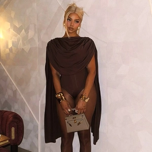 Detail of dark brown sleeveless cowl neck bodysuit with elegant draped front and accessories