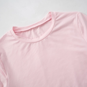 Detail shot of pink round neck lounge set showing stitching and soft cotton fabric texture