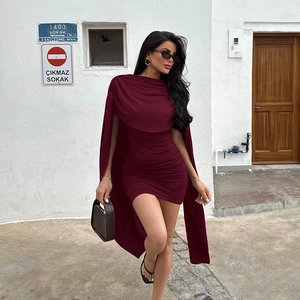 Detail of burgundy bodycon dress with elegant draped cowl neckline and ruching