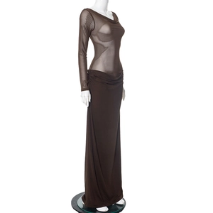 Detail view of the elegant mesh patchwork and waist pleats on this brown long dress