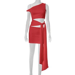Detailed view of red one-shoulder mini dress with waist cutout and long ribbon tie