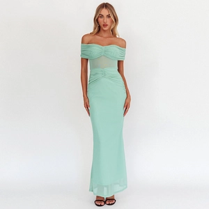 Detailed close-up of the mesh pleats and ruched texture on this mint green maxi dress