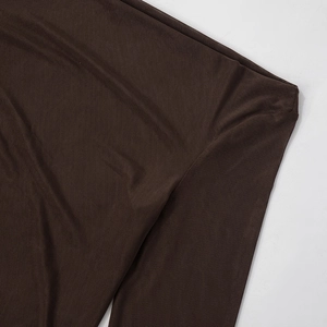 Detailed close-up showing the dark brown fine mesh texture of this sheer maxi dress