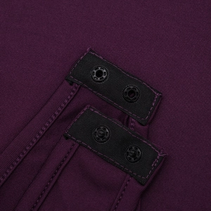 Macro view of snap button closure on deep purple ribbed knit bodysuit fabric