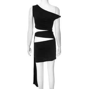 Detail of black one-shoulder mini dress with geometric waist cutout and long tie ribbon