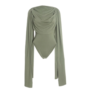 Detailed view of sage green bodysuit with a draped cowl neck and long split cape sleeves