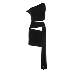 Detail of one-shoulder black bodycon dress with waist cutout and long ribbon straps