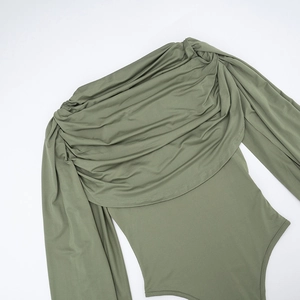 Detail of army green bodysuit with pleated cowl neck design and stretchy fabric texture