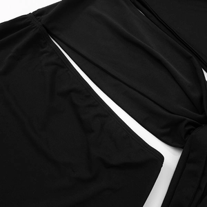 Detailed close-up showing fine stitching and hollow-out design on a black summer dress