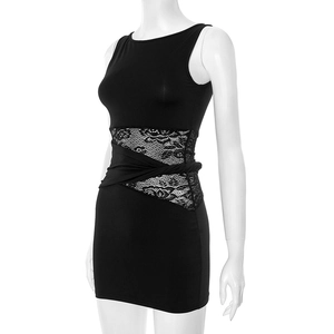 Detail of waist design with lace patchwork and elegant twist knot on black dress