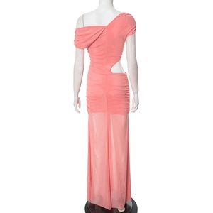 Detailed view of pink one-shoulder gown featuring waist cutout and ruched fabric texture