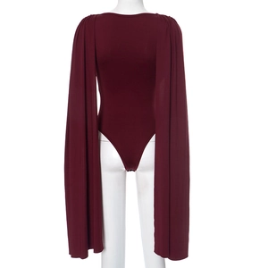 Detail view of the back of a burgundy bodysuit featuring dramatic long cape sleeves