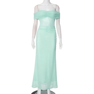 Detailed view of the layered mesh ruching and pleats on a mint green strapless maxi dress