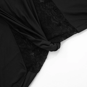 Detail of elegant black lace patchwork with floral patterns and fine hollowed stitching