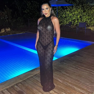 Detail of sheer black lace halter dress with crochet patterns for beach parties