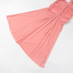 Detailed view of elegant pink ruched evening dress with premium gathered fabric details