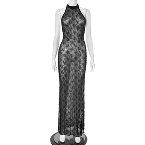 Detail of the black lace halter neck long dress with intricate floral patterns and textures