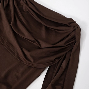 Detail of elegant cowl neckline and drape folds on dark brown sleeveless bodysuit