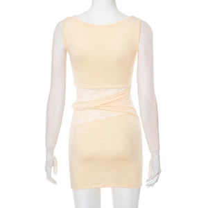 Detail of the high neckline and intricate white lace patchwork on the waist of this dress