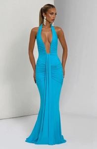 Detail of elegant bright blue halter neck maxi dress with pleated waist and long sash decoration