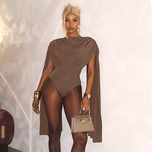 Detail of brown cowl neck bodysuit featuring long cape style split sleeves and drapes