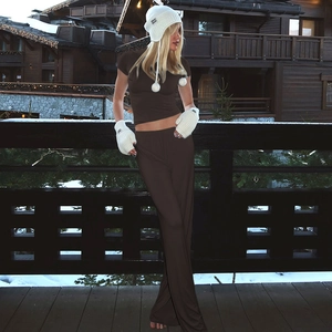 Deep brown two-piece lounge set with short sleeve crop top and wide leg high-waist pants
