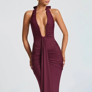 Detail view of the elegant deep purple halter V-neck dress with ruched waist texture
