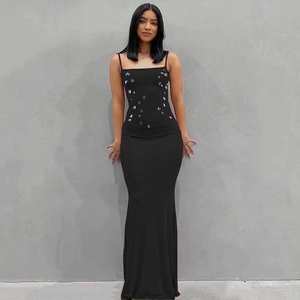 Detail of square neck black bodycon maxi dress with silver sequin embellishments