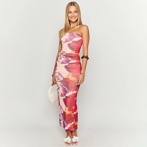 Detailed close-up of vibrant pink and purple floral print on a strapless A-line maxi dress