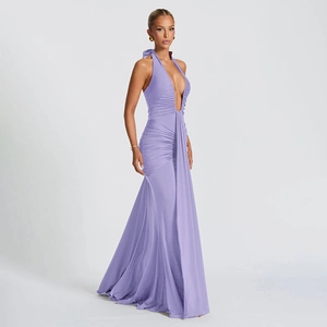 Detail of elegant light purple halter neck maxi dress with ruched waist and v-neckline