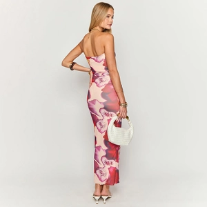 Back view of a floral print strapless maxi dress with vibrant pink and purple blossoms