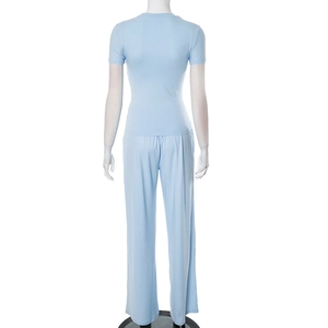 Detail view of the back of light blue loungewear set with t-shirt and wide-leg pants