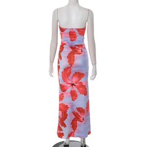 Detailed back view of backless floral print maxi dress with ruched shirring details