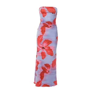 Detailed view of the tube top maxi dress featuring red floral print and waist pleats